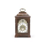 A fine and rare mid 18th century silver-mounted carved mahogany quarter repeating table clock wit...