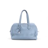 Blue Jean Clemence Victoria II 35, Hermès, c. 2009, (Includes padlock, keys, cloche, and luggage...