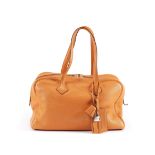 Orange Clemence Victoria 35, Hermes, c. 2008, (Includes padlock, key, cloche and luggage tag)