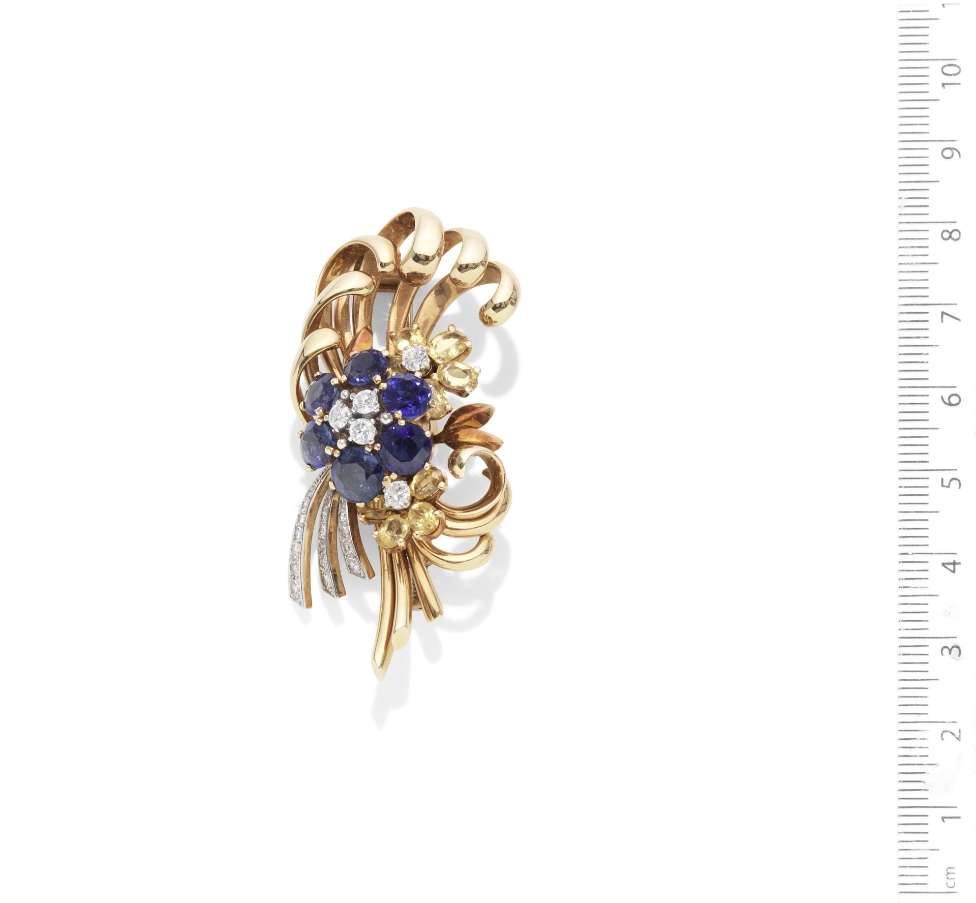 A sapphire and diamond flower brooch, by Patek Philippe,