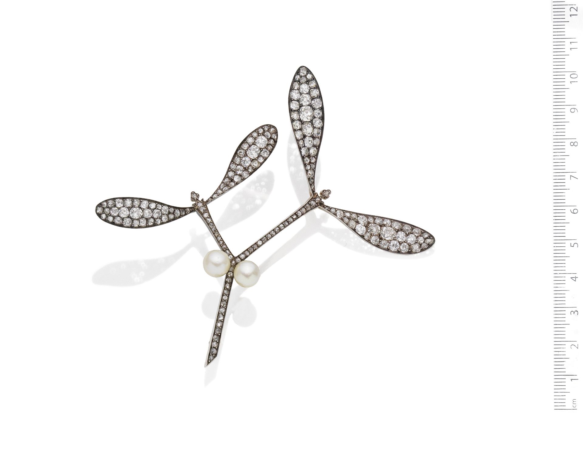 A diamond and pearl mistletoe brooch,