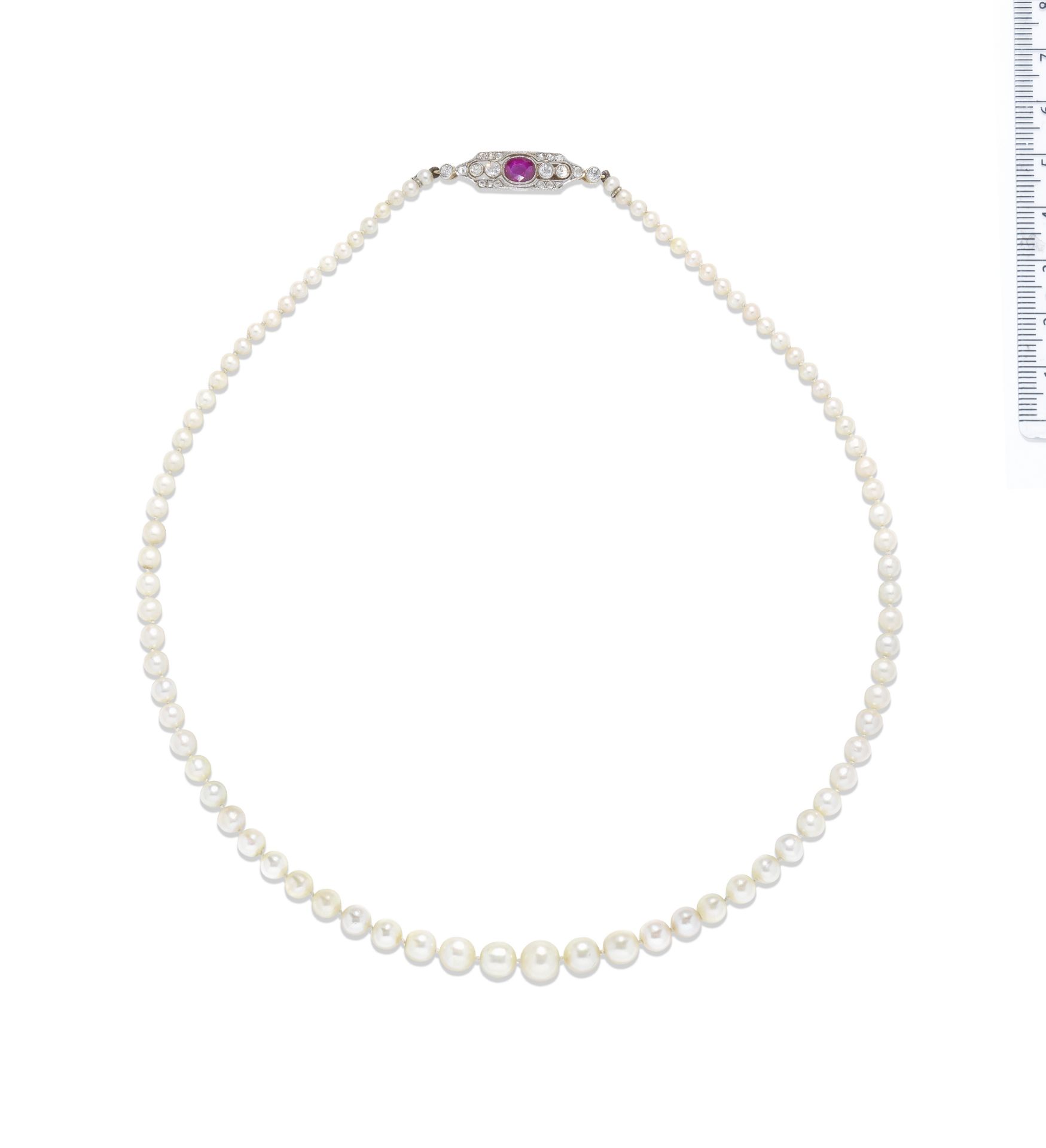 A natural pearl necklace with ruby and diamond clasp,
