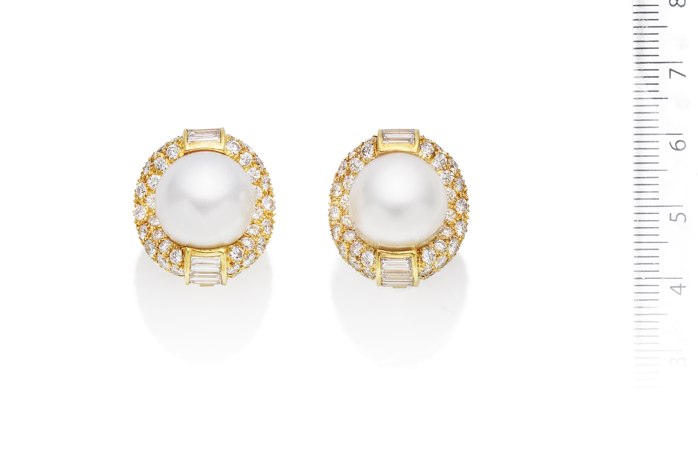 A pair of cultured pearl and diamond earclips, by Cartier