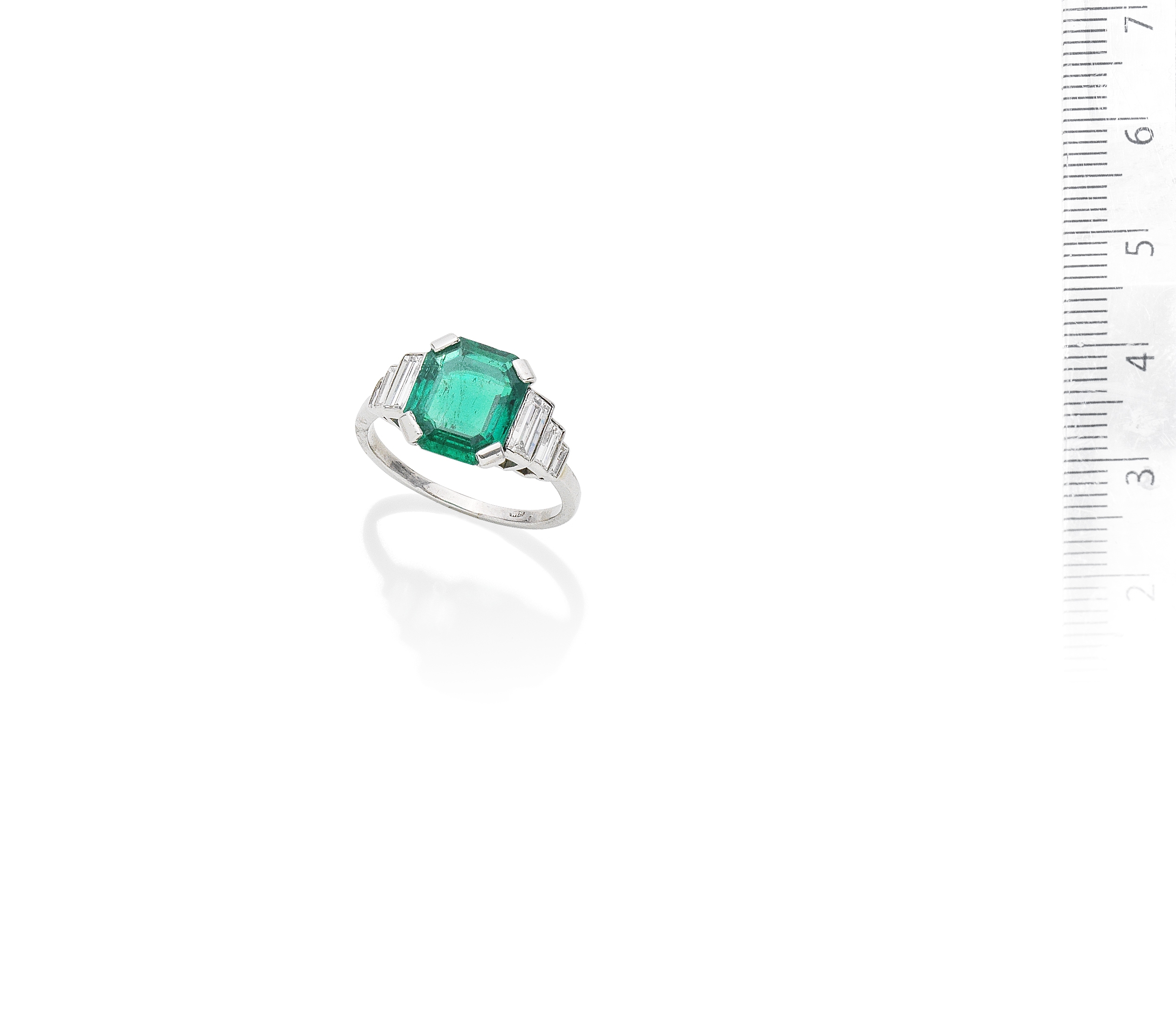 An emerald and diamond ring,