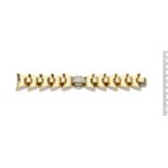 A gold and diamond bracelet, by Boucheron,