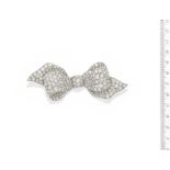 A diamond bow brooch,