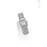 A diamond watch, Tank Francaise, by Cartier