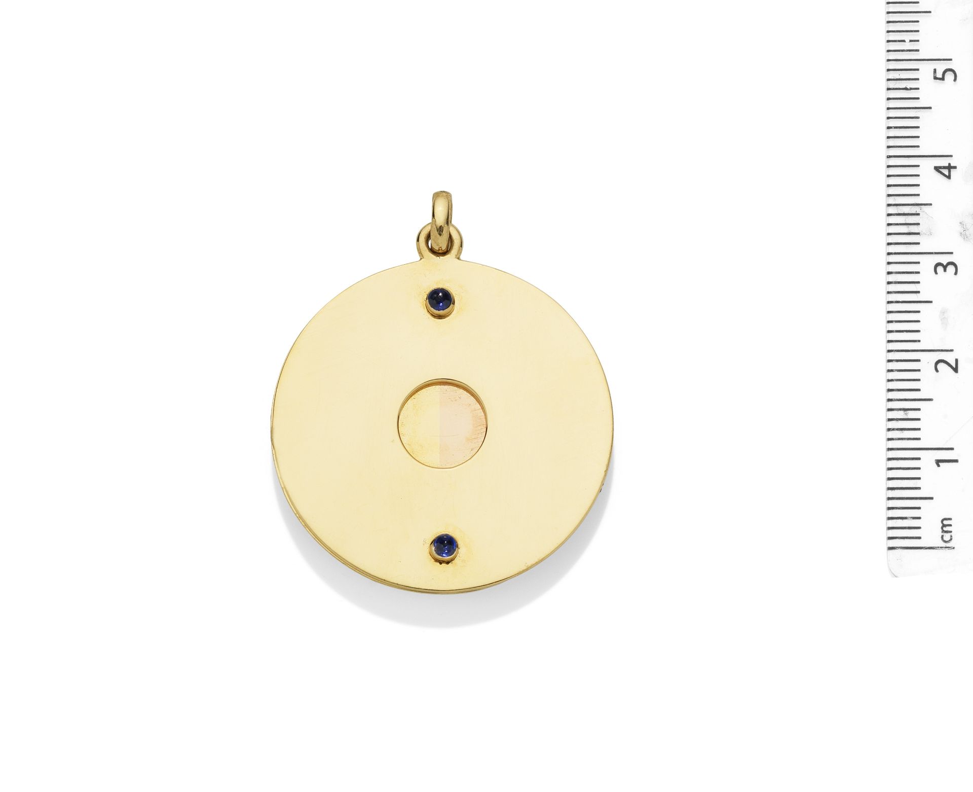 A gold and sapphire cigarillo cutter pendant, By Cartier,