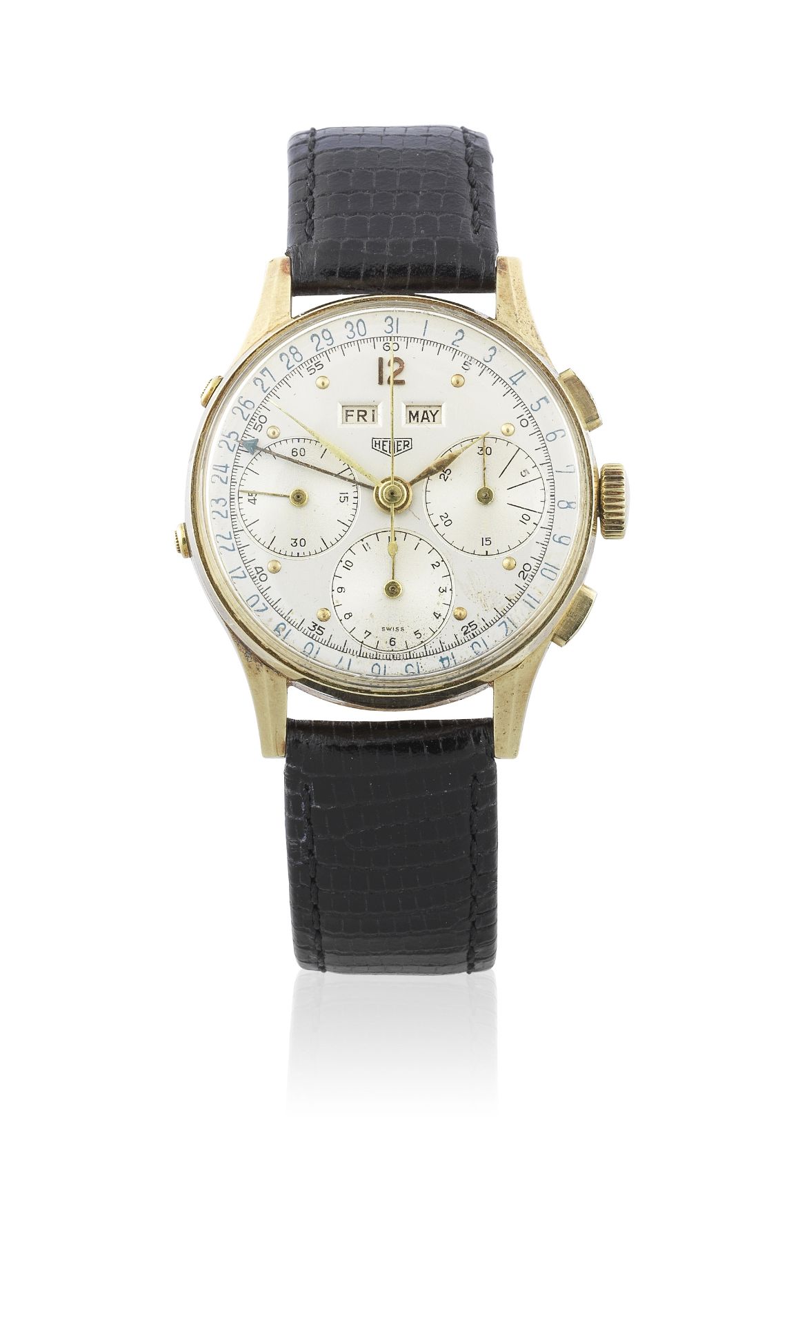 Heuer. A 14K gold manual wind triple calendar wristwatch Circa 1950