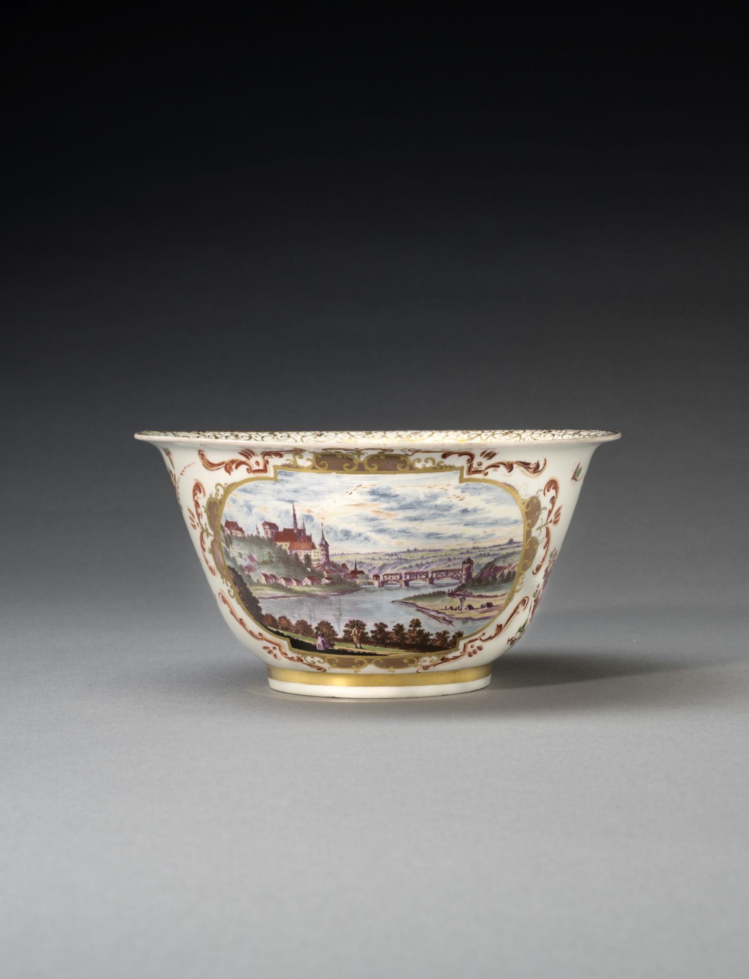 A Meissen waste bowl depicting the Albrechtsburg, housing the Meissen manufactory, circa 1726