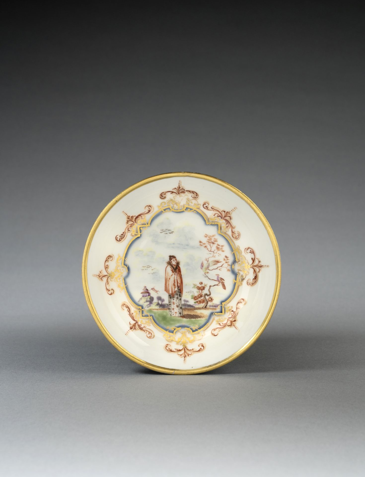 A rare early Meissen underglaze-blue-ground saucer, circa 1722