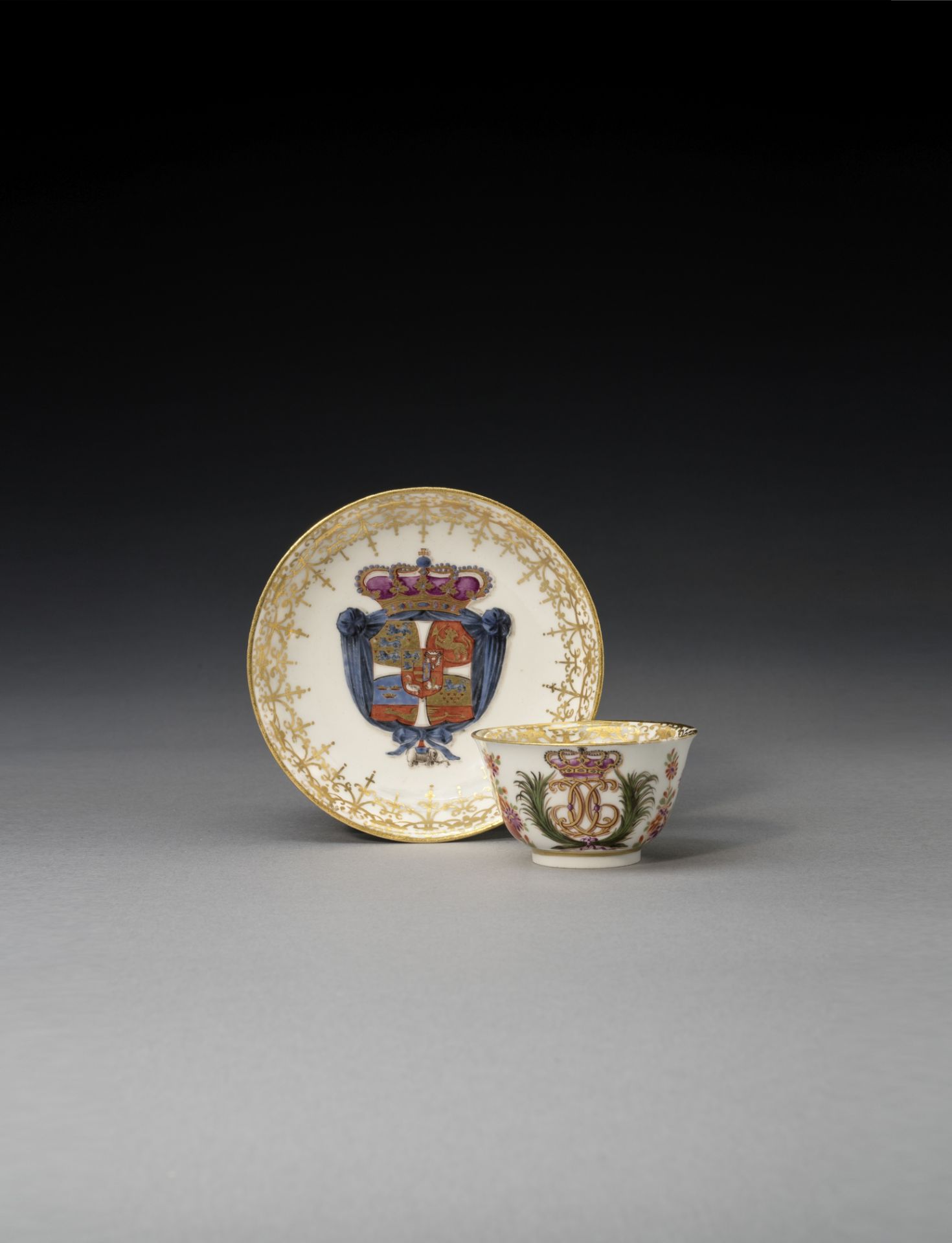 A Meissen armorial teabowl and saucer from the service for Christian VI of Denmark, circa 1730-35