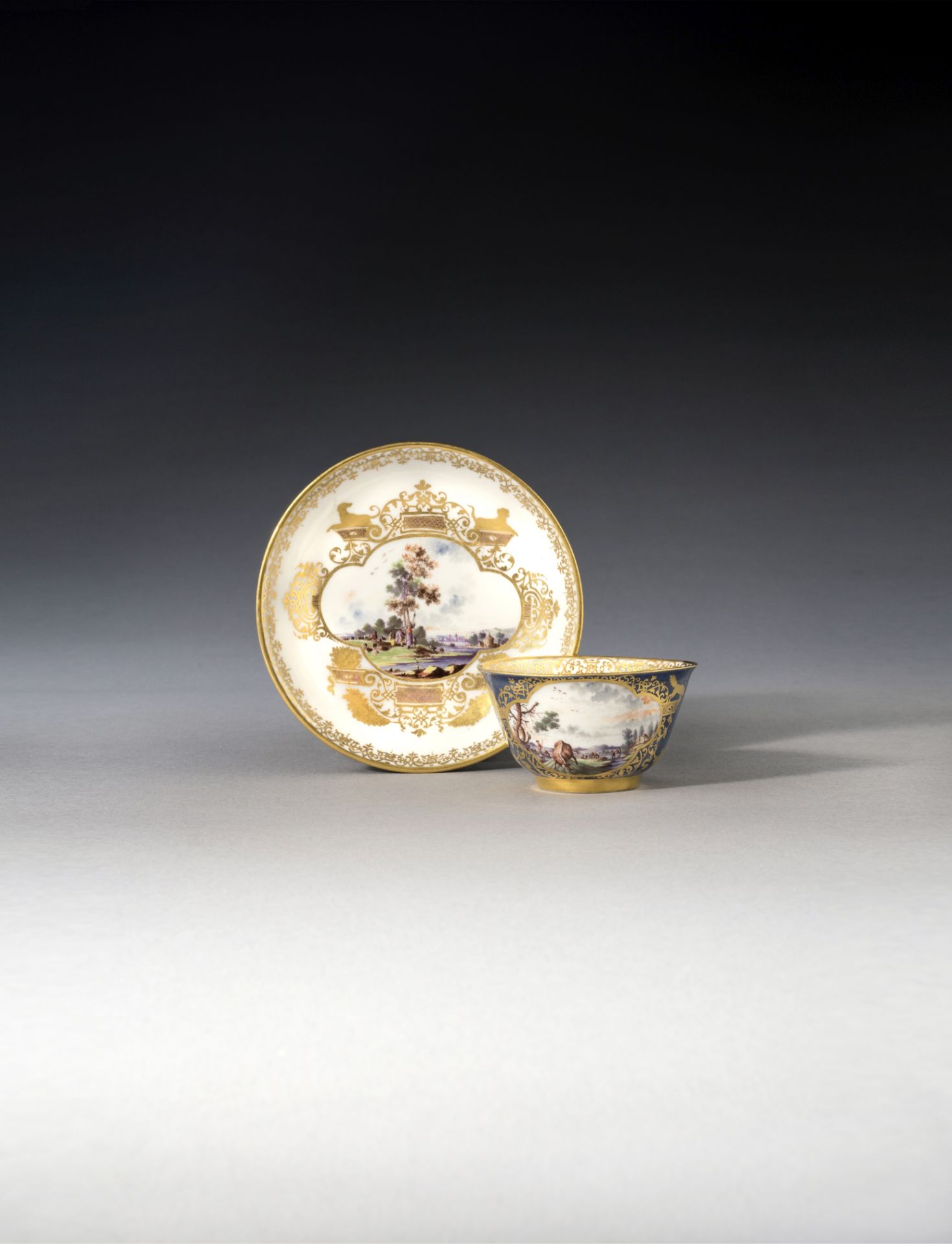 A rare Meissen underglaze-blue-ground teabowl and saucer, circa 1735-40