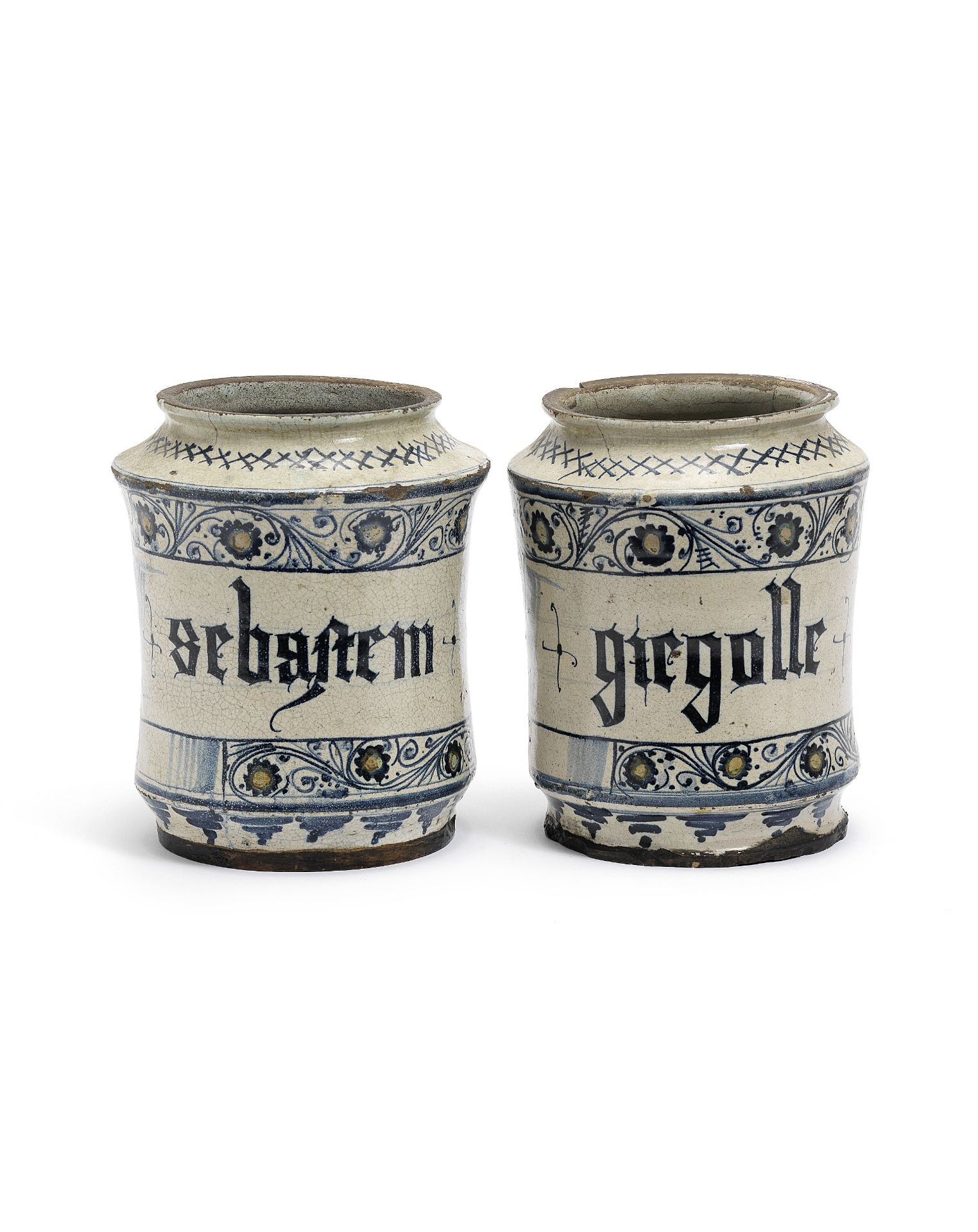 A Pair of Pesaro or Faenza maiolica albarelli, late 15th Century