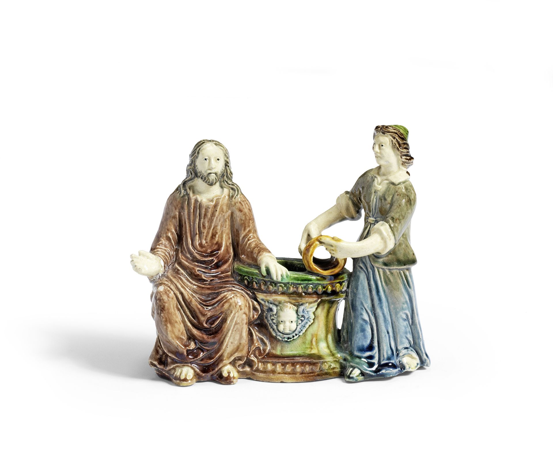 A French Palissy-style lead-glazed group of Jesus and the Woman of Samaria, possibly Avon, 17th c...