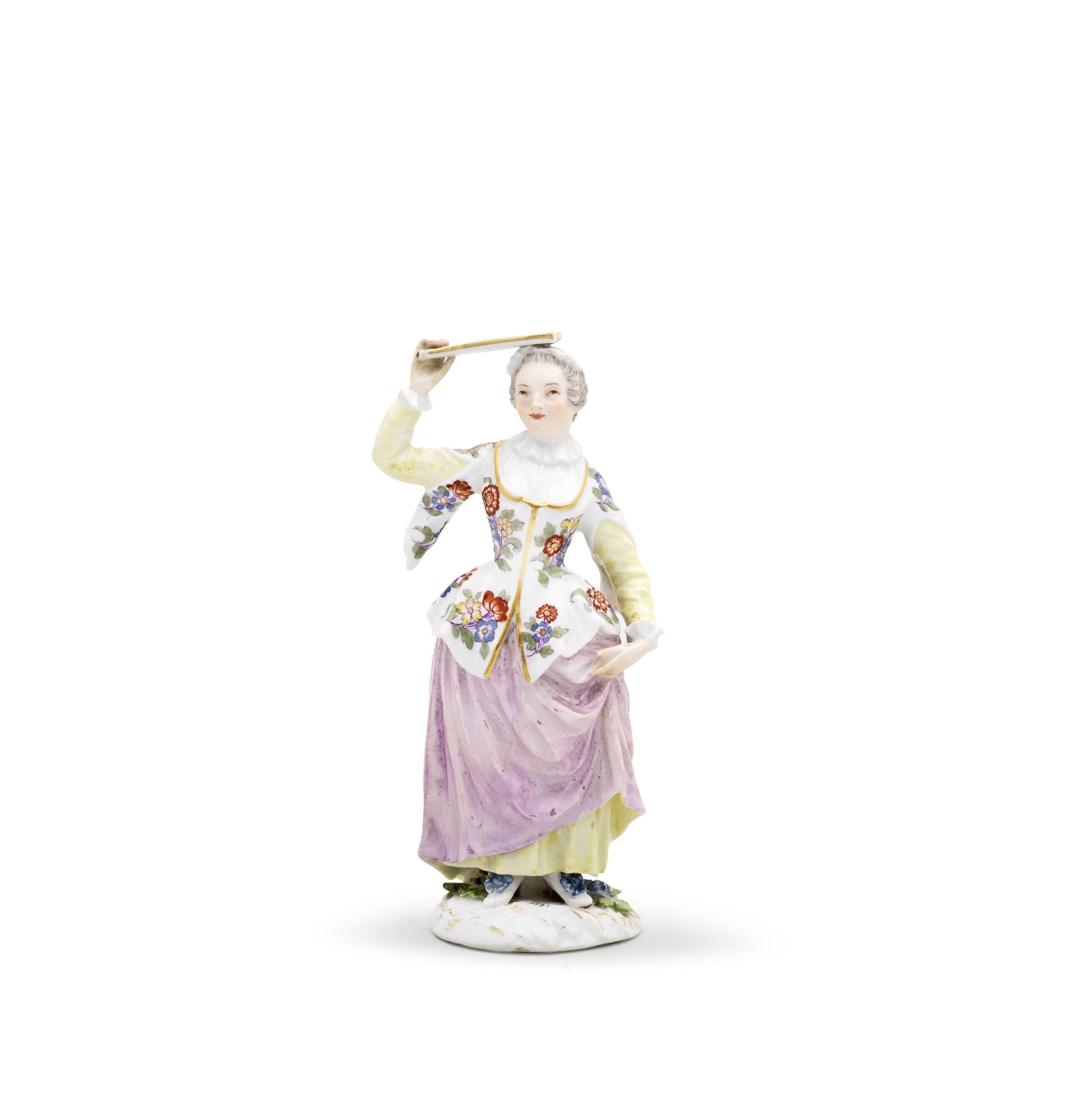 A Meissen figure of a lady with a fan, mid 18th century