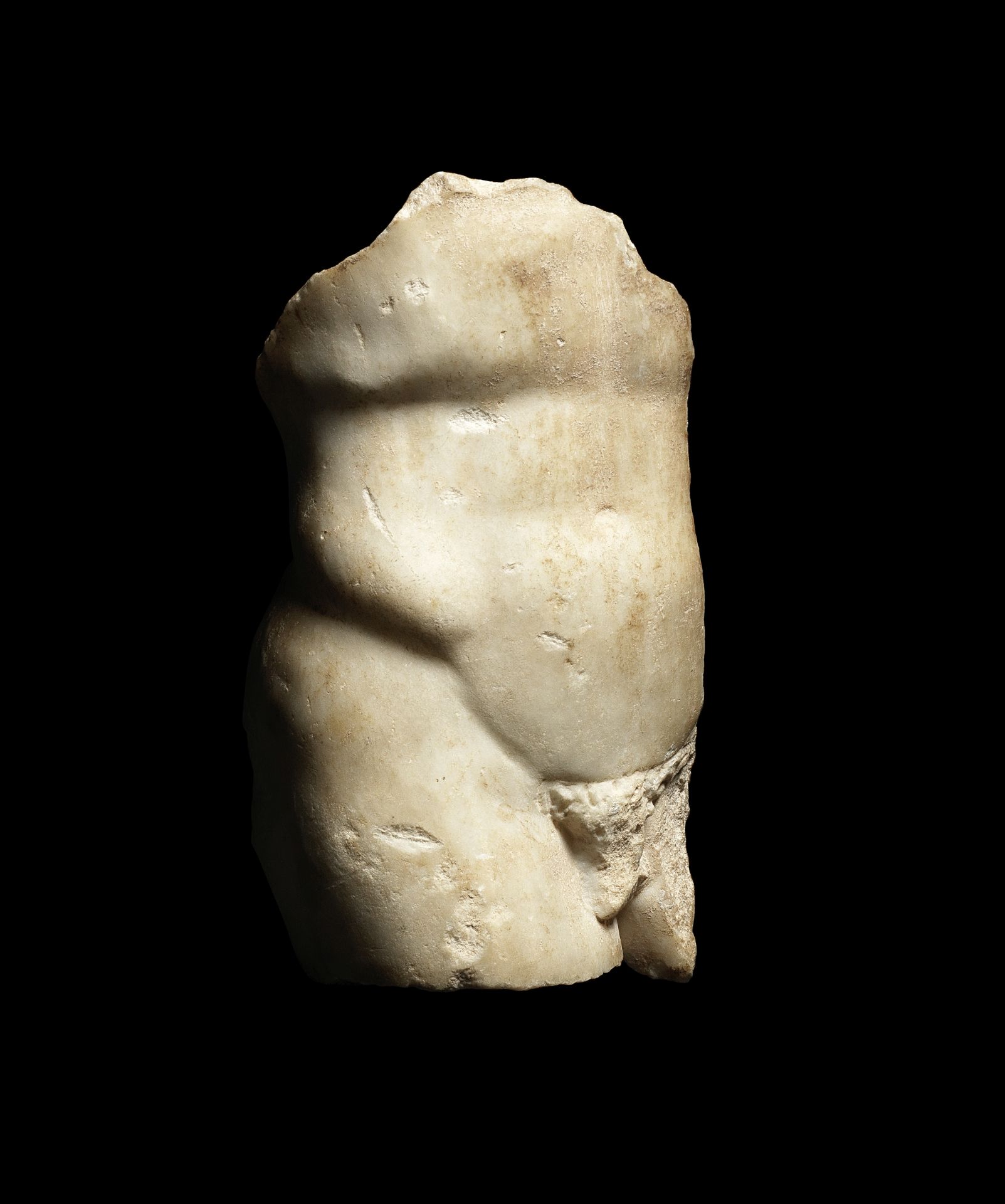 A fragmentary Roman marble male torso