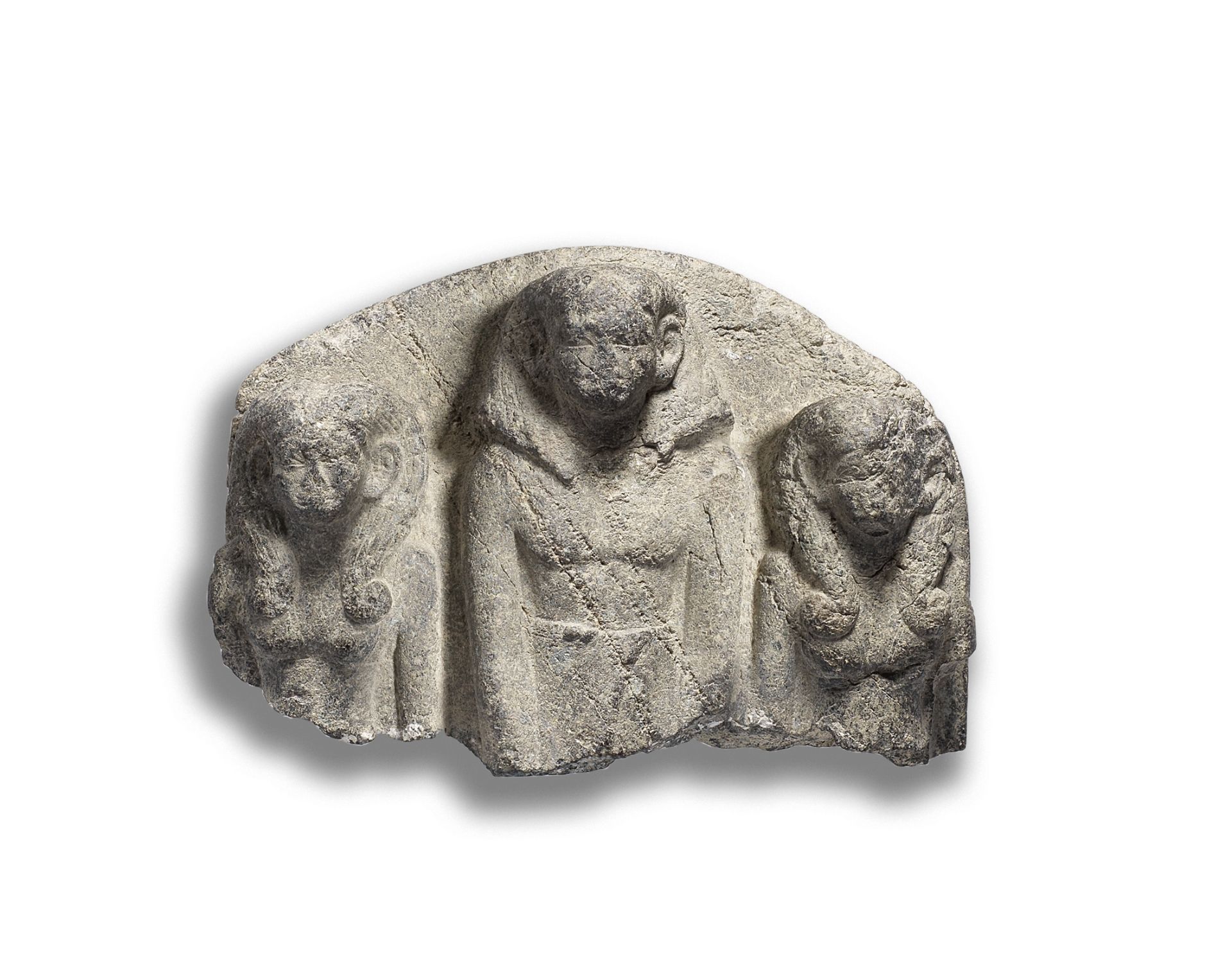 An Egyptian granite triad relief fragment