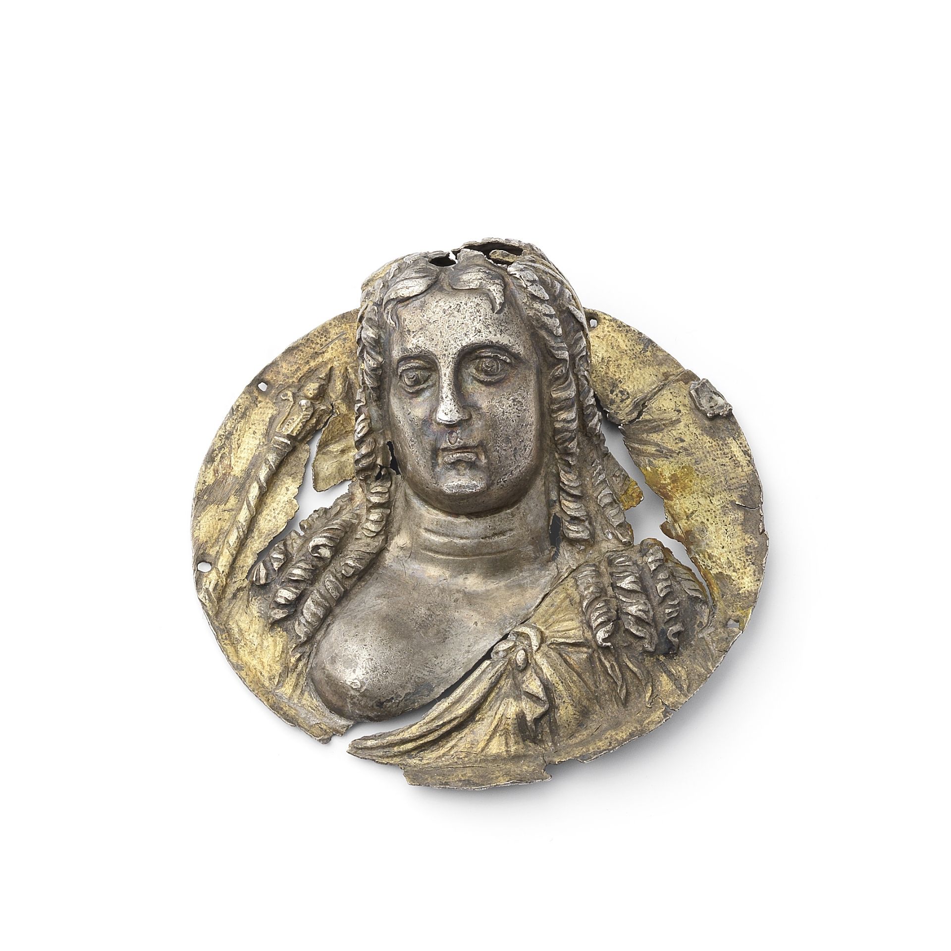 A Greek parcel gilt silver emblema in the form of a bust of Isis