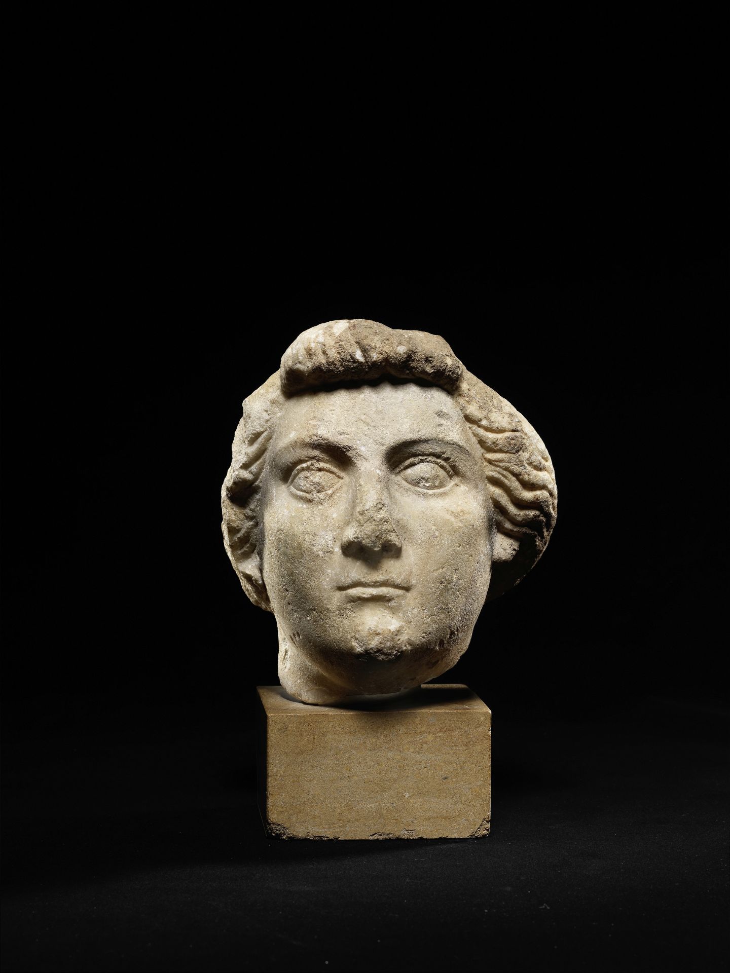 A Roman marble female portrait head