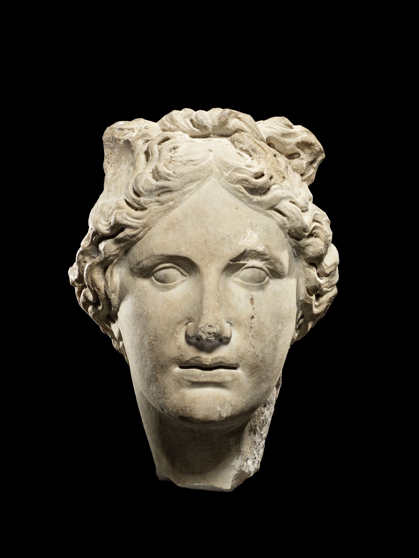 A Roman marble head of Apollo