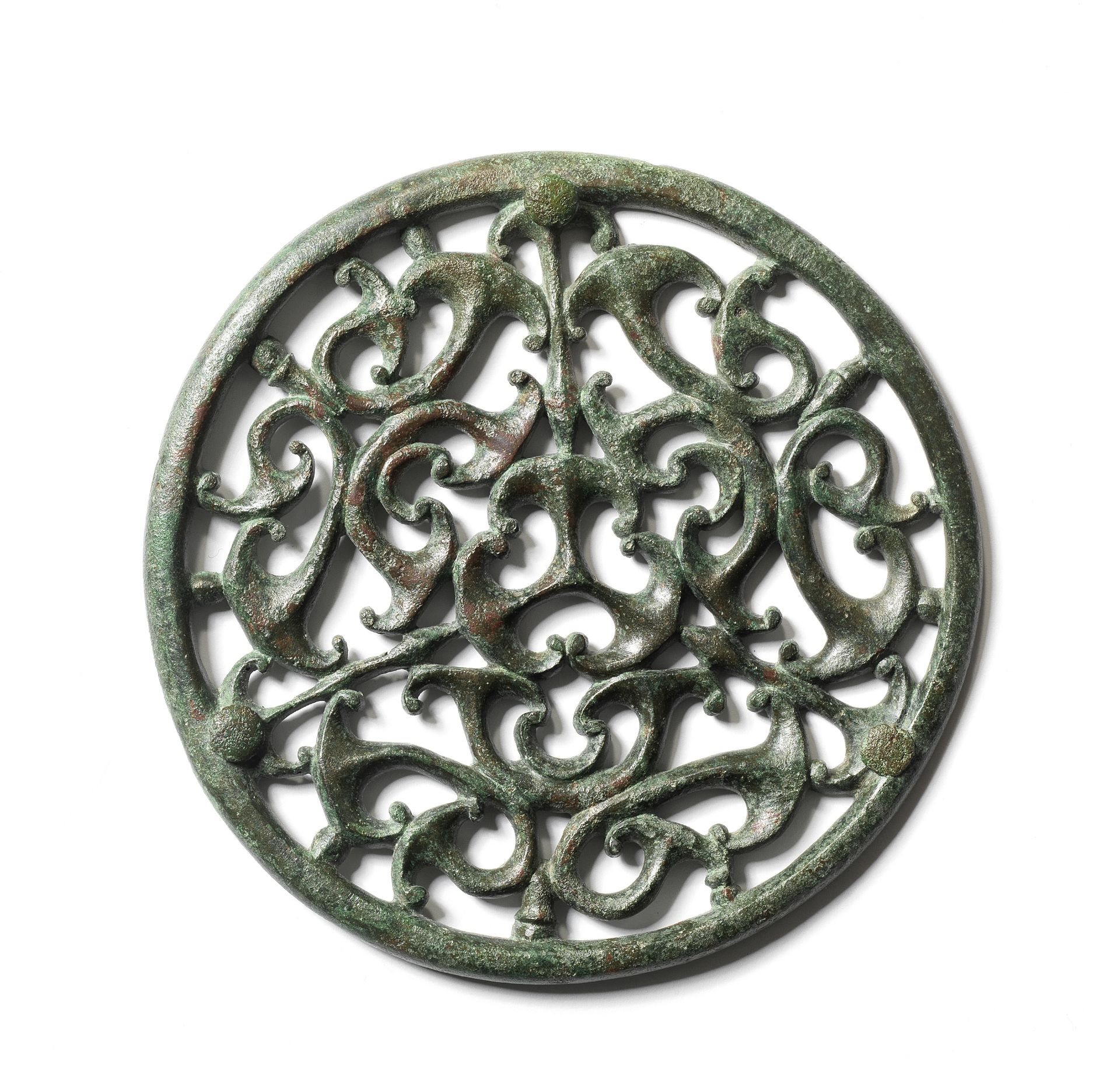 A large Celtic bronze trumpet whorl roundel