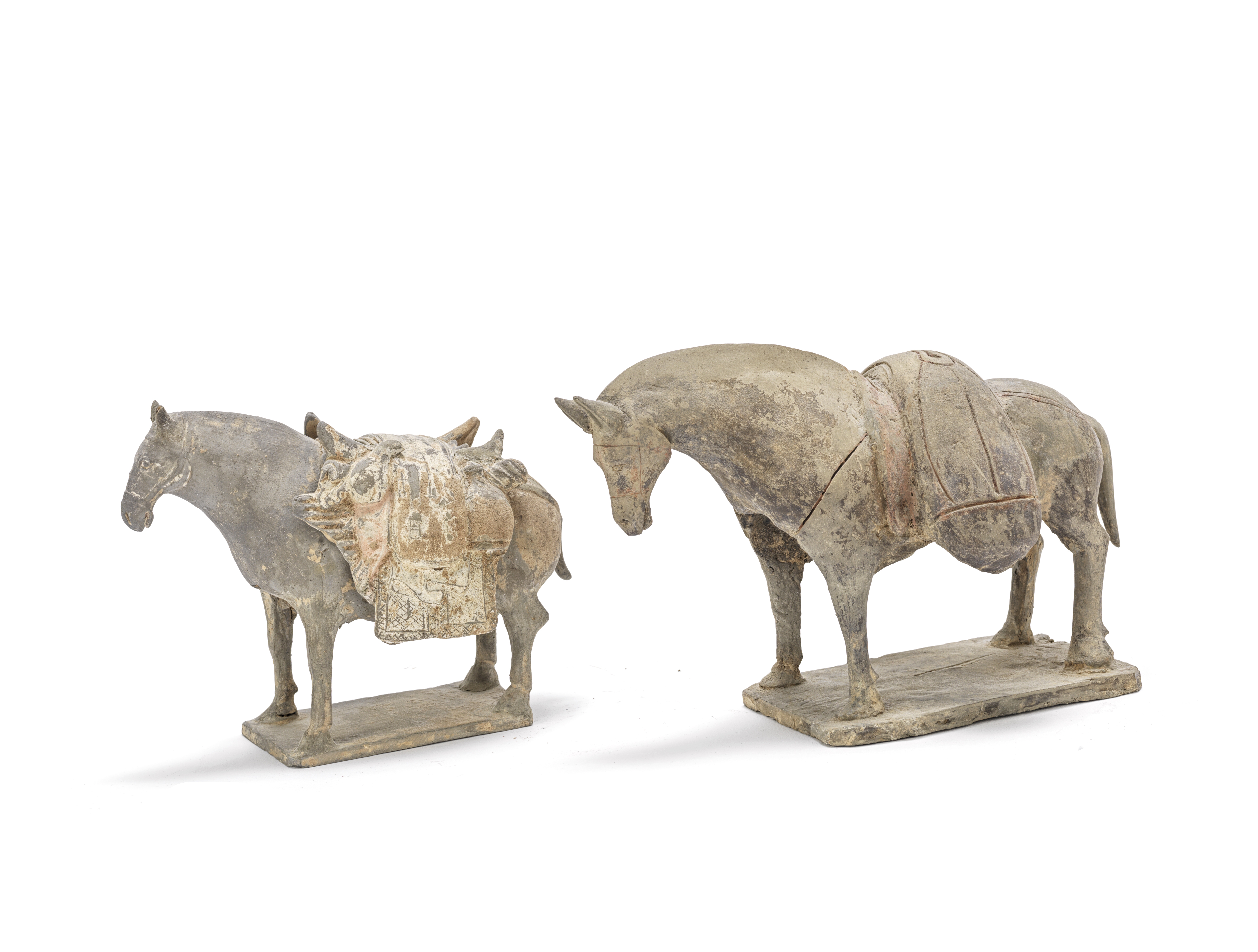 A painted grey pottery model of a donkey and a painted grey pottery model of a pack horse Norther...