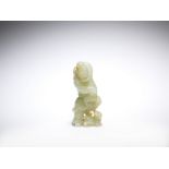 A pale green jade 'foreigner' carving