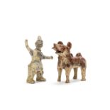 A grey pottery model of a warrior and a russet glazed pottery model of a dog Han Dynasty (2)
