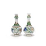 An associated pair of famille verte bottle vases Kangxi (2)