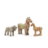 A grey pottery standing horse and two glazed pottery horses Yuan Dynasty and possibly Song Dynast...