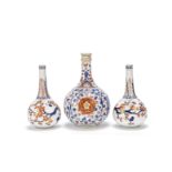 A Chinese Imari apothecary bottle and a pair of sprinklers Kangxi and circa 1725 (3)