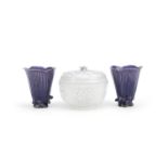 A blanc-de-Chine box and cover; together with a pair of aubergine-glazed 'Magnolia' cups Early 18...