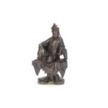 A lacquered and gilt wood figure of Guanyin 17th/18th century