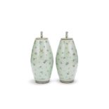 A pair of famille rose celadon ground jars and covers 19th century (4)