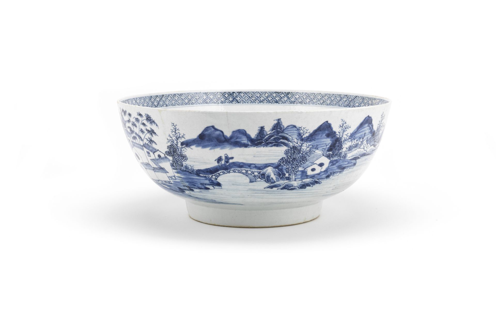 A large blue and white 'landscape' punch bowl 18th century