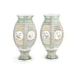 A pair of famille verte pierced lanterns and stands 19th century (4)