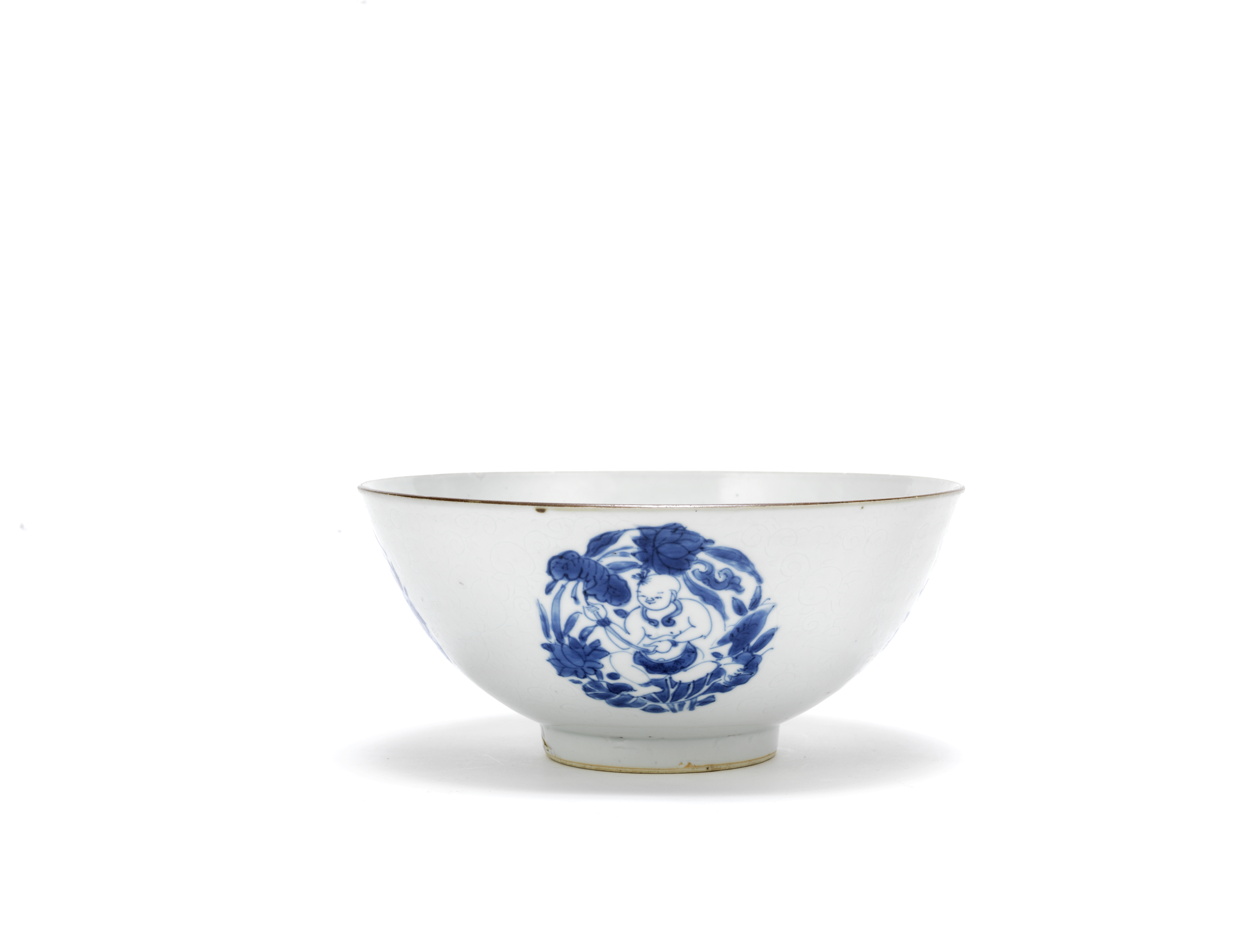 A blue and white and anhua 'boys' bowl Shunzhi