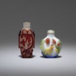 A red overlay 'dragon' snuff bottle and a three-colour overlay 'cockerel' bottle 18th/19th centur...