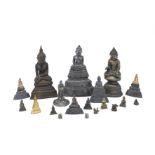 A large group of variously bronze, white metal and yellow metal Buddhist figures and weights Thai...