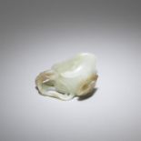 A pale green and mushroom coloured jade 'lotus' washer Song/Ming Dynasty