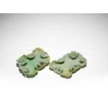 A pair of jadeite 'lotus' washers and a pair of small jadeite vases Late Qing Dynasty/ Republic P...