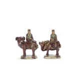 A matched pair of flambé-glazed Shiwan figures Chengu Zhaizao marks, 19th/20th century (2)