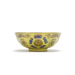 A famille rose yellow-ground bowl and a blue and white saucer Tongzhi and Guangxu (2)