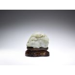 A pale green and russet jade ram group, sanyang 18th century (2)