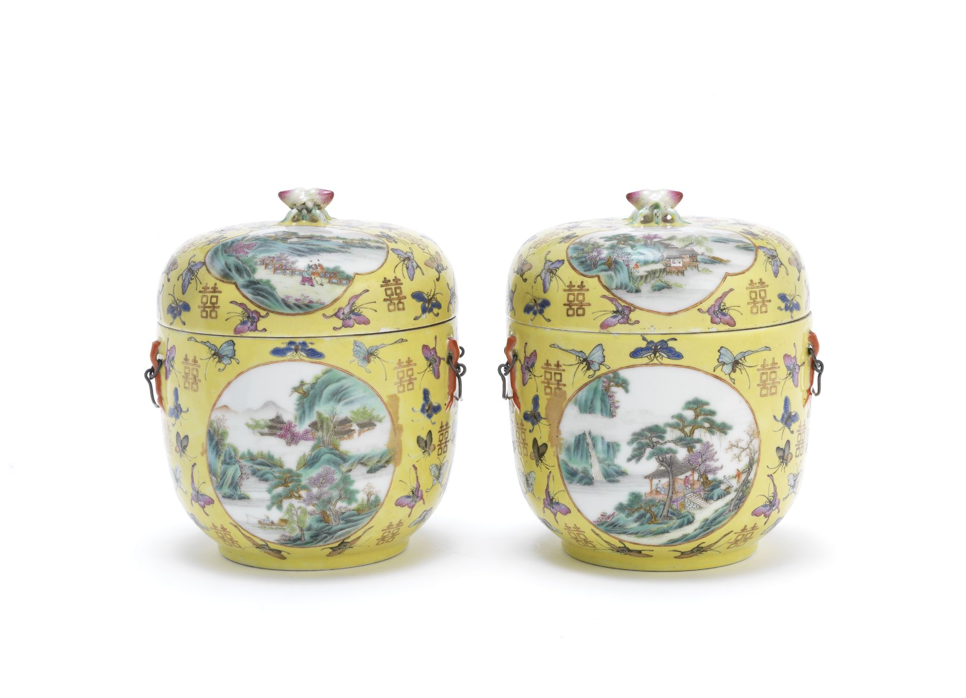 A pair of famille rose yellow-ground jars and covers Tongzhi iron red four-character marks and pr...