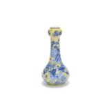 A yellow-ground Ming-style 'landscape' garlic-head pear-shaped vase Kangxi