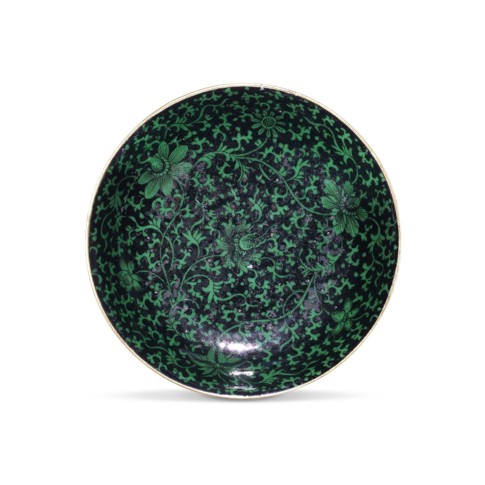 A green and black enamelled 'lotus' saucer Qianlong minyao seal mark and of the period