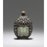 A green jade-inlaid white metal repoussé bottle The jade plaques, 18th century; the bottle late 1...