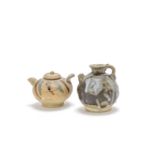 A phosphatic brown glazed ewer and a Changsha brown and green splashed bird-form ewer and cover ...